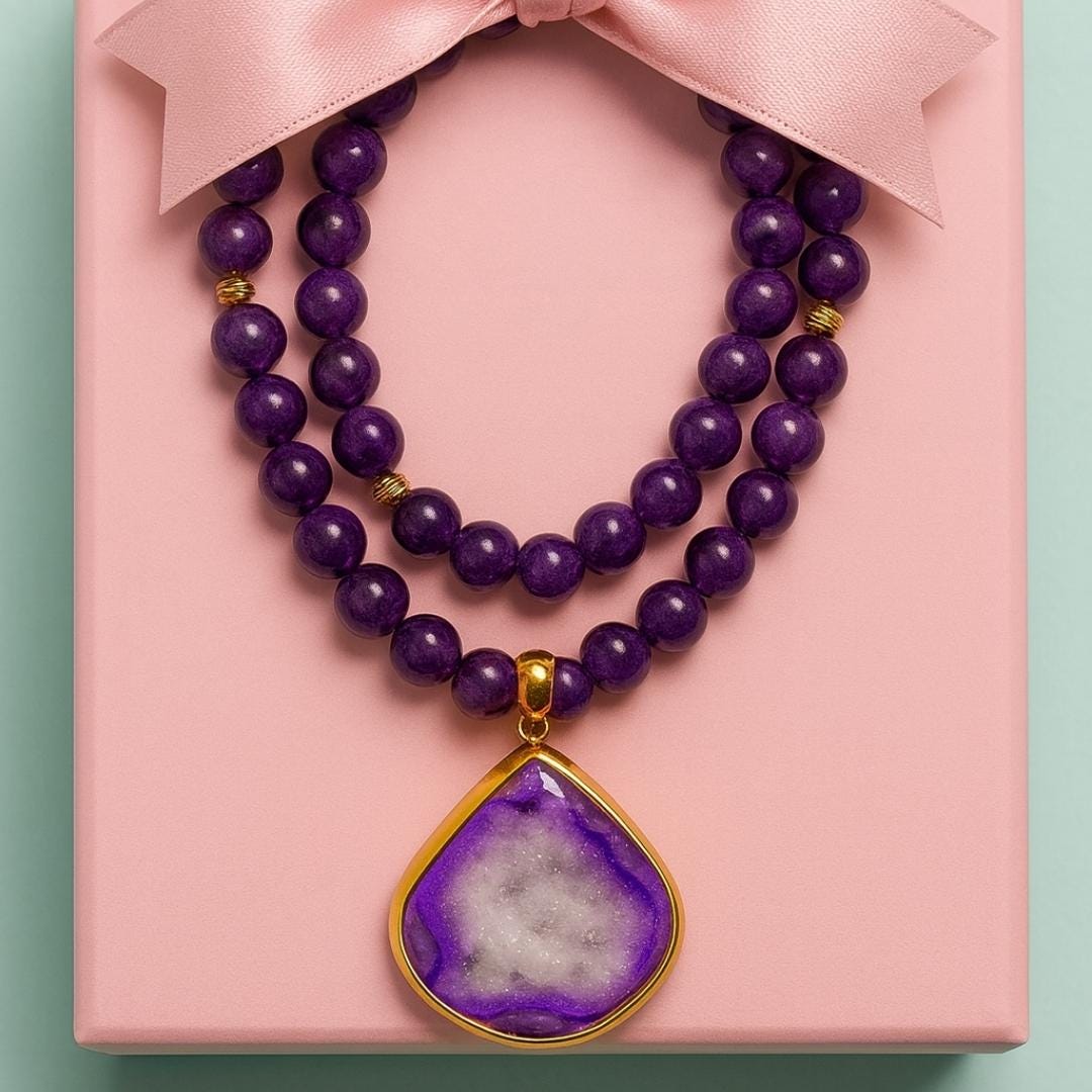 Amethyst and druzy agate pendant necklace with a presentation box.