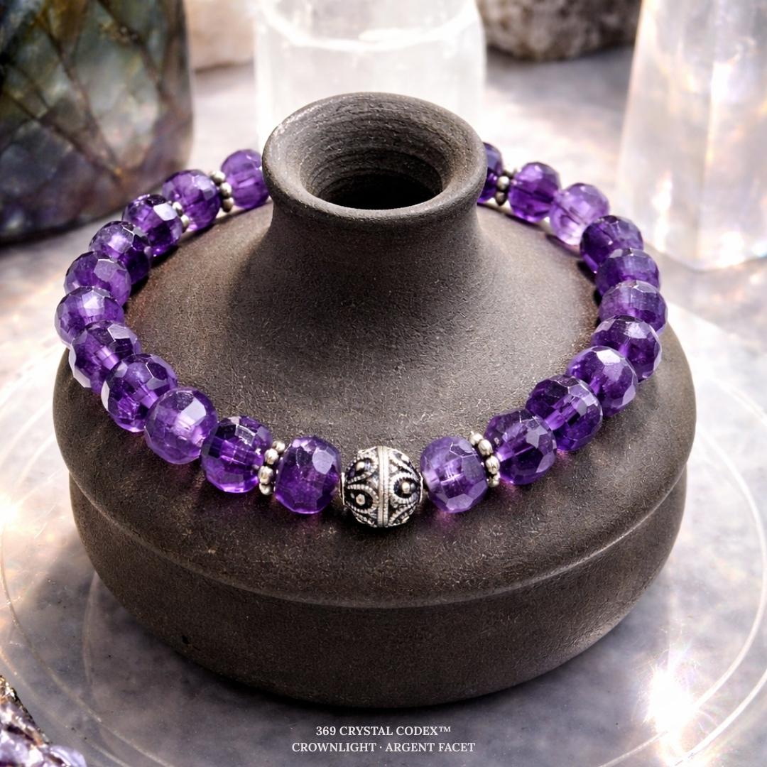 Amethyst bead bracelet on a jewelry display.