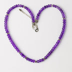 Amethyst bead necklace.