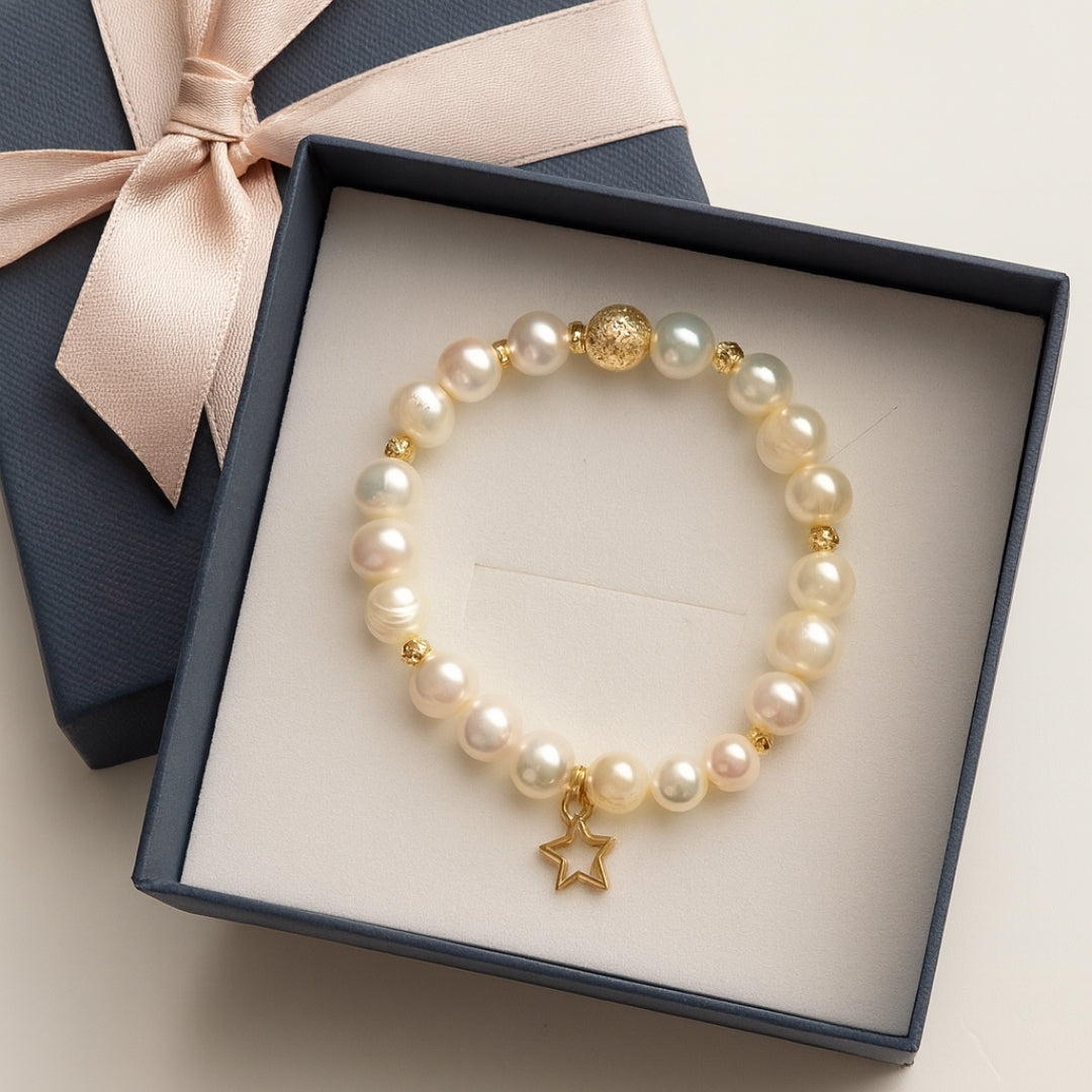 Pearl Charm Bracelet with 8mm genuine pearls - gold star charm a luxury celestial