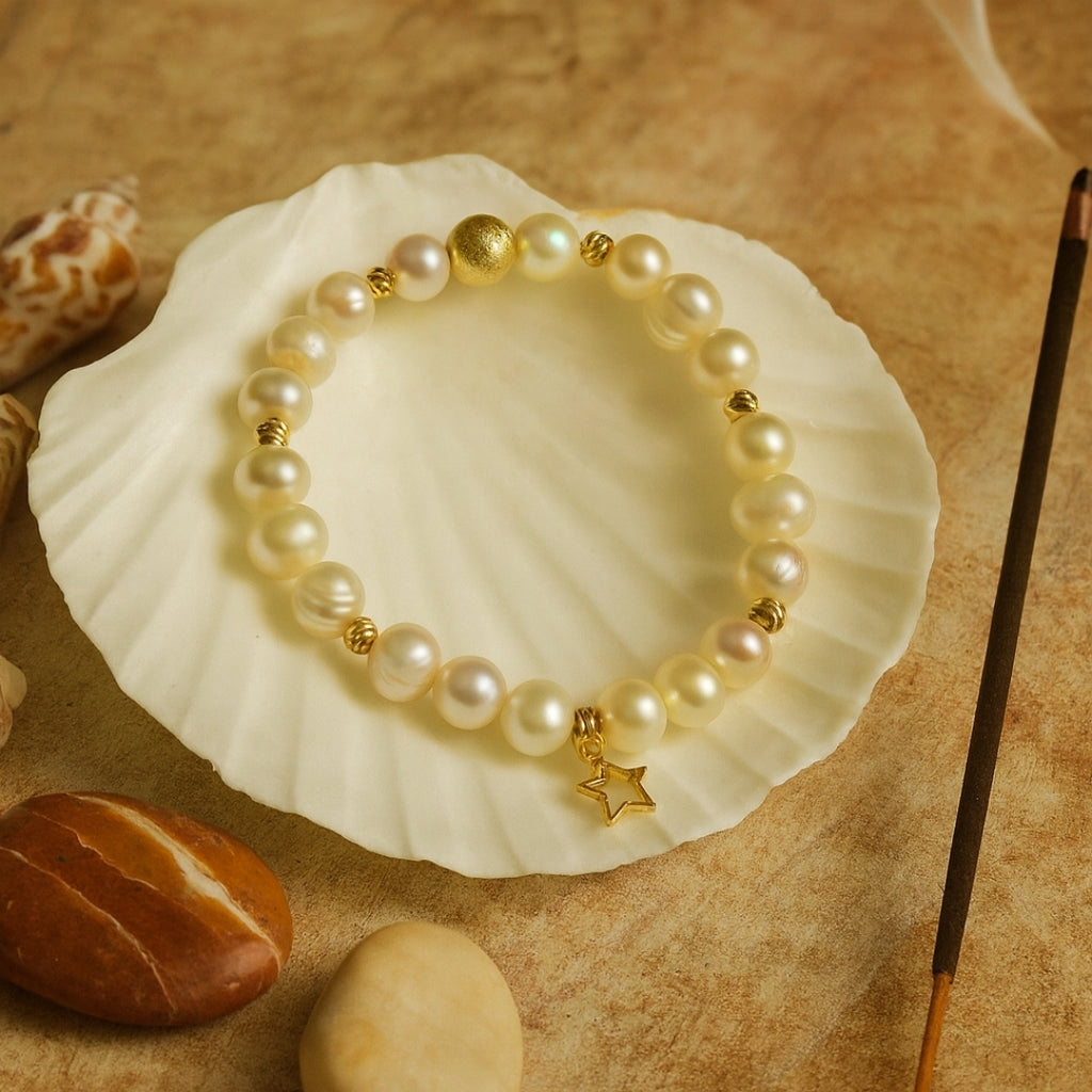 Pearl Charm Bracelet with 8mm genuine pearls - gold star charm a luxury celestial