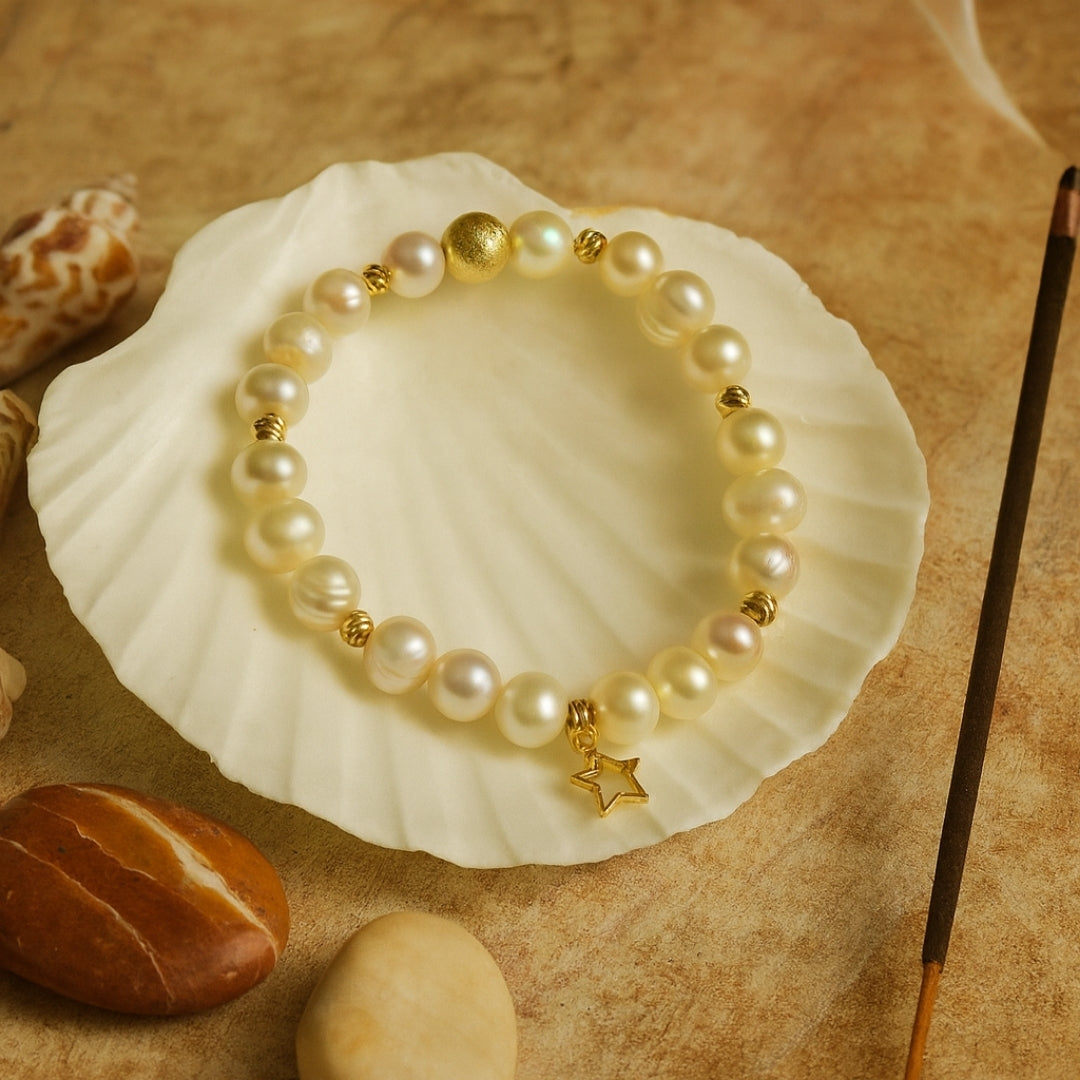 Pearl Charm Bracelet with 8mm genuine pearls - gold star charm a luxury celestial