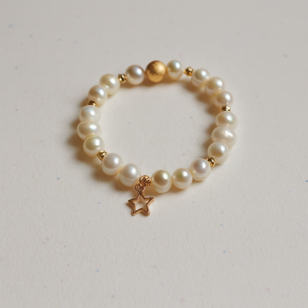 Pearl Charm Bracelet with 8mm genuine pearls - gold star charm a luxury celestial
