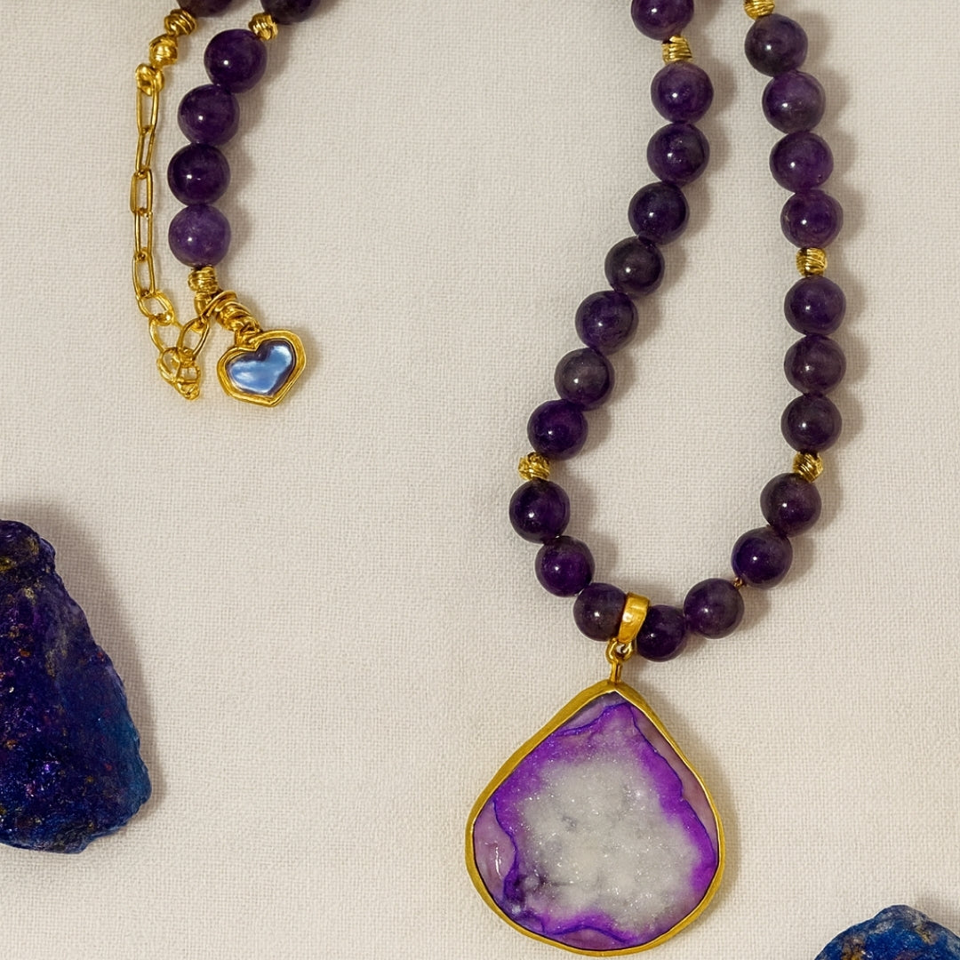 Buy this Amethyst Druzy Agate Necklace featuring 8mm beads and 18K Gold Plated spacers for ultimate healing. Shop this Copper Druzy Pendant jewelry to enhance your clarity and spiritual protection today. Order this Natural Gemstone Necklace as a prestigious February Birthstone Gift or a unique Luxury Gift for Her. Get this Healing Crystal Jewelry to balance your Crown Chakra and find peace. Choose this Bestseller Necklace for its high-end sparkle. Purchase now.